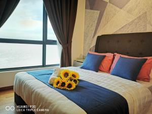 Postel nebo postele na pokoji v ubytování HomeZz Imperium Residence Kuantan Studio Seaview