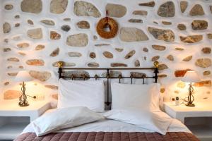 Cama ou camas em um quarto em Villa Peristeri
