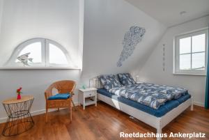Postel nebo postele na pokoji v ubytování Reetidyll am Haff