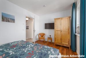 Postel nebo postele na pokoji v ubytování Reetidyll am Haff