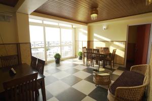 Posezení v ubytování Hotel Hill Queen near Sherpa Gumba Darjeeling Mall 5 Min Couple Friendly