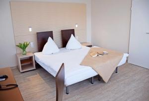 Postel nebo postele na pokoji v ubytování Appartementhaus Sellin