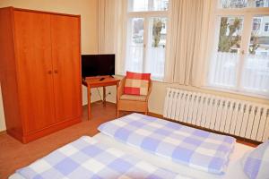 Postel nebo postele na pokoji v ubytování Appartementhaus Sellin