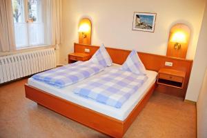 Postel nebo postele na pokoji v ubytování Appartementhaus Sellin