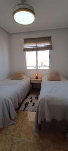 Posteľ alebo postele v izbe v ubytovaní PMT17 - Penthouse apartment with pool and close to beach