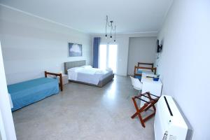 Letto o letti in una camera di Sand Hotel
