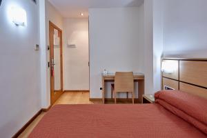 Postel nebo postele na pokoji v ubytování Doña Lola