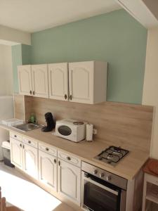 Dapur atau dapur kecil di La Saint Quentinoise (avec cour)