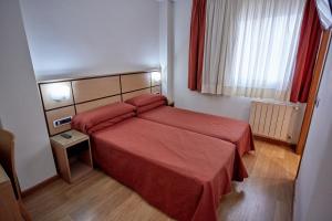 Postel nebo postele na pokoji v ubytování Doña Lola