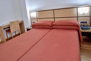 Postel nebo postele na pokoji v ubytování Doña Lola