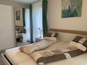 Postel nebo postele na pokoji v ubytování Haus Rubin