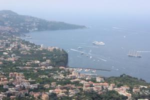 a view of a city with boats in the water at B&B Villa Ursa Major in Vico Equense