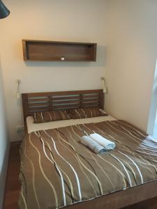 Postel nebo postele na pokoji v ubytování Apartmán Šumavský Buk 14 Brčálník