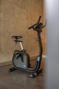 a exercise bike parked next to a wall at Kaiser von Österreich, Historik- und Thermalhotel in Bad Radkersburg