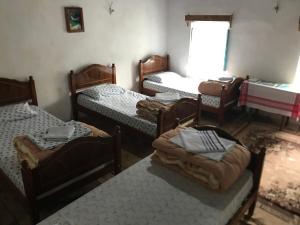 Postel nebo postele na pokoji v ubytování Marash Rrgalla Guesthouse