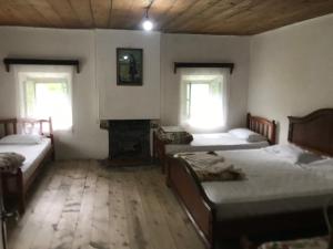 Postel nebo postele na pokoji v ubytování Marash Rrgalla Guesthouse