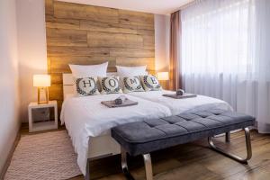 Postel nebo postele na pokoji v ubytování Design Maisonette - 24h Self-Check- GONDWANA Park - bis 7 Pers - In direkter Weihernähe - Parkplatz - WiFi - Balkon -Terrasse