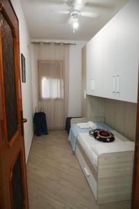 Postel nebo postele na pokoji v ubytování Casa Donatella a Isola