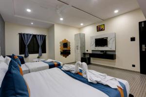 Postel nebo postele na pokoji v ubytování DIAMOND HOTEL + 37 fotografií