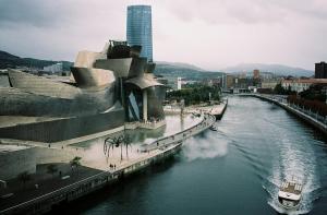 a view of a river with a boat in it at MODERN BILBAO in Barakaldo