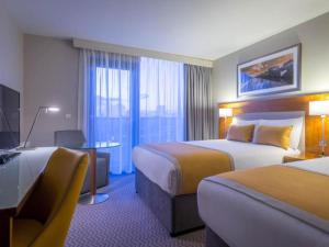 Krevet ili kreveti u jedinici u okviru objekta Maldron Hotel Tallaght
