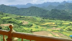 a view from a balcony of a terraced field at Cổng Trời Homestay in Ha Giang +13 photos
