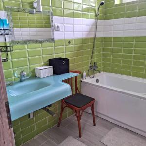 Ванная комната в Centrum Villa Szolgáltatóház