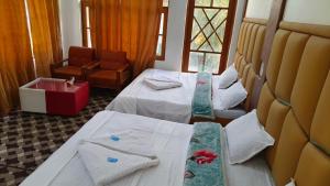 Gulsitara Resorts-Gulmarg客房内的一张或多张床位