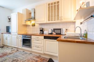 Kuchyň nebo kuchyňský kout v ubytování Apartment "Deluxe" Innsbruck - Mutters