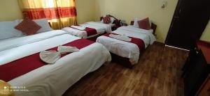 Katil atau katil-katil dalam bilik di Hotel Plaza Nepal