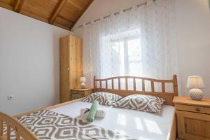 Posteľ alebo postele v izbe v ubytovaní Dalmatian country house Irena + 37 fotografií