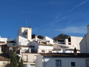 a group of white buildings in a city at Placeta Boutique in Rute
