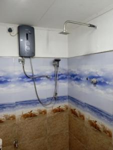 Koupelna v ubytování 152-Abhaya Place Homestay