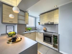 Kitchen o kitchenette sa Apartament z widokiem na panoramę miasta