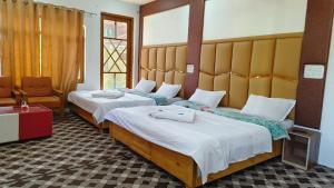Gulsitara Resorts-Gulmarg客房内的一张或多张床位
