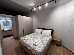 Elia Luxury Residence客房内的一张或多张床位