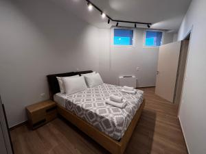Elia Luxury Residence客房内的一张或多张床位