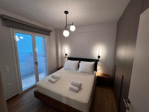 Elia Luxury Residence客房内的一张或多张床位