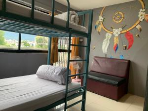 Postel nebo postele na pokoji v ubytování Doze Hostel