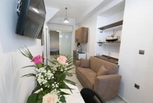 TV a/nebo společenská místnost v ubytování Aigli Guest House