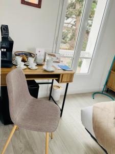 Posezení v ubytování Le Castel Cabourg hôtel & SPA- Restaurant La Calypso