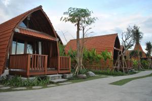 a small house with a deck and a fence at Room in Villa - Love Without boundaries num9759 in Siyut
