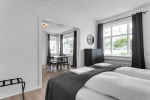 Voodi või voodid majutusasutuse Eiriksgata Apartments by Heimaleiga toas +53 fotot