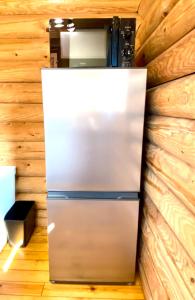 Een keuken of kitchenette bij on a journey 千葉 九十九里