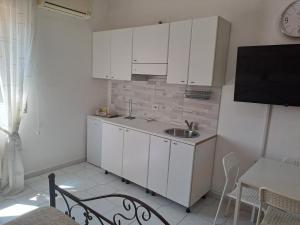 Kuchyň nebo kuchyňský kout v ubytování B&B SAN MARCO + 45 fotografií