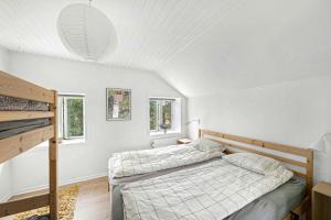 Postel nebo postele na pokoji v ubytování Holiday Apartment With Ocean Views
