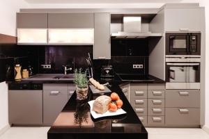 a kitchen with a counter with vegetables on it at Neue Technologie Systemlösungen GmbH in Osterode