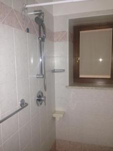 Kúpeľňa v ubytovaní Hotel Scandola