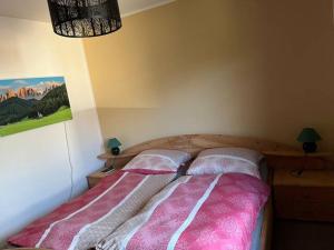 Voodi või voodid majutusasutuse Binis Murtalblick toas