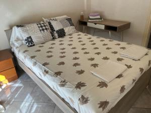 Posteľ alebo postele v izbe v ubytovaní Xronis apartments